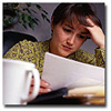 concerned woman reading documents